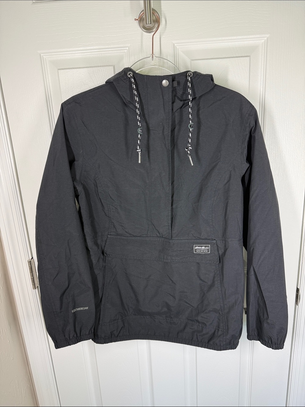 Eddie Bauer black pullover weatheredge rain coat with kangaroo pocket size small